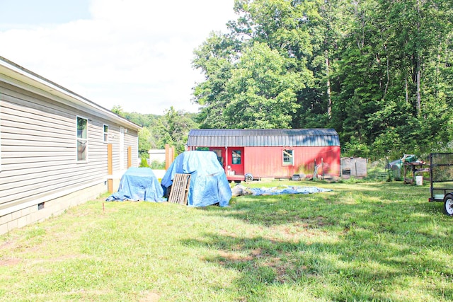 610 Freeman Branch Rd, East Bernstadt, KY 40729 - view of yard with an outbuilding