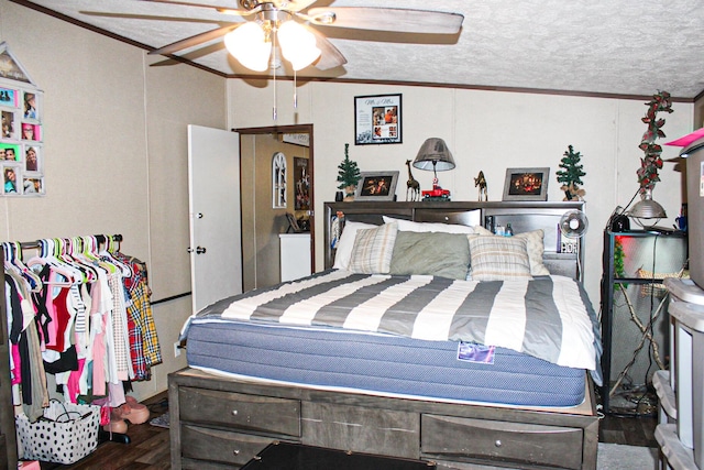 610 Freeman Branch Rd, East Bernstadt, KY 40729 - bedroom with wood finished floors, crown molding, a textured ceiling, and a ceiling fan