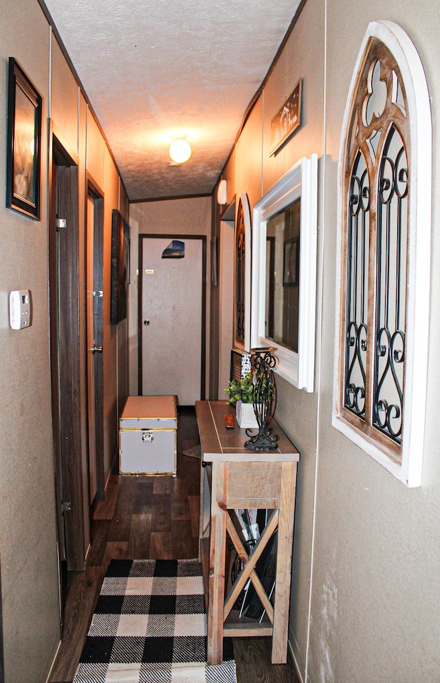 610 Freeman Branch Rd, East Bernstadt, KY 40729 - hallway with a textured ceiling and parquet floors