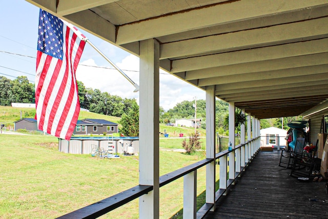 610 Freeman Branch Rd, East Bernstadt, KY 40729 - wooden deck with a lawn and an outdoor pool