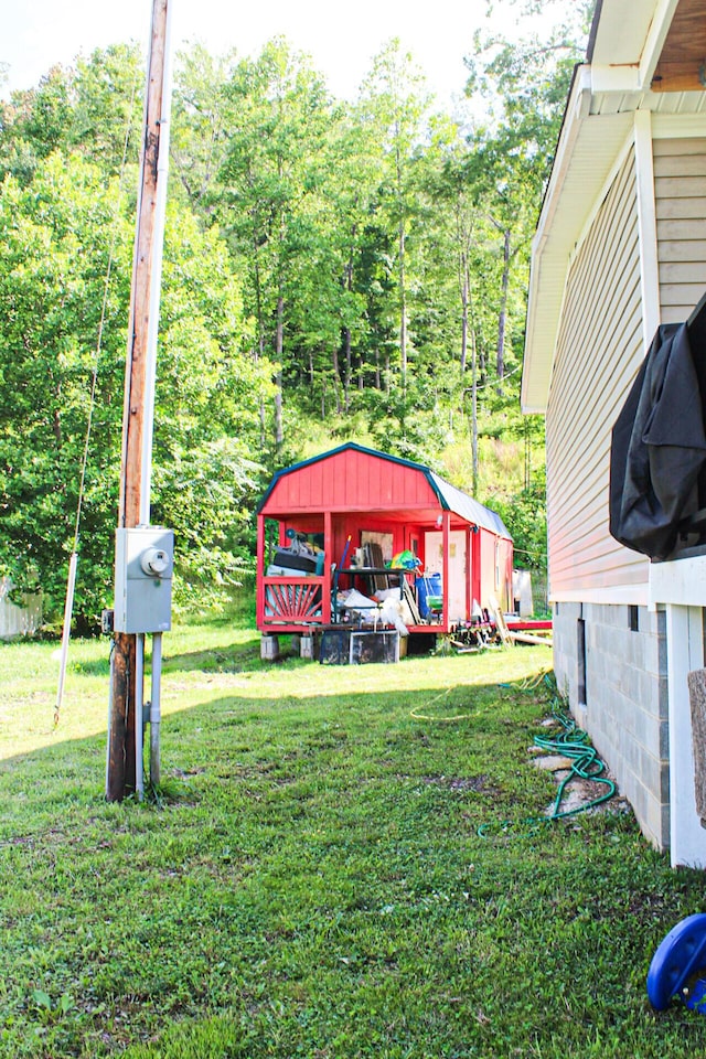 610 Freeman Branch Rd, East Bernstadt, KY 40729 - view of grassy yard with an outdoor structure