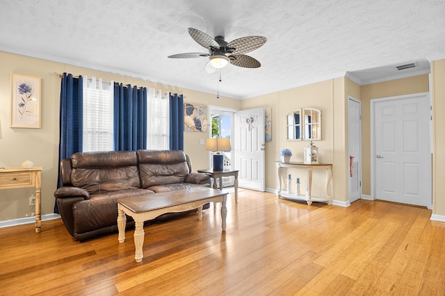 1809 Pine Top Rd, London, KY 40741 - living area with light wood-style flooring, ceiling fan, and a textured ceiling