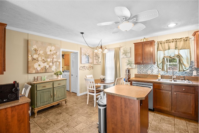 1809 Pine Top Rd, London, KY 40741 - kitchen with dishwasher, a center island, a ceiling fan, tasteful backsplash, and washer / dryer