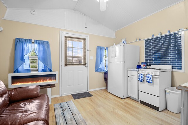 1809 Pine Top Rd, London, KY 40741 - kitchen featuring white appliances, light wood-style floors, light countertops, vaulted ceiling, and open floor plan