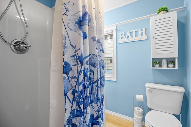 1809 Pine Top Rd, London, KY 40741 - full bath featuring a shower with shower curtain and wood finished floors