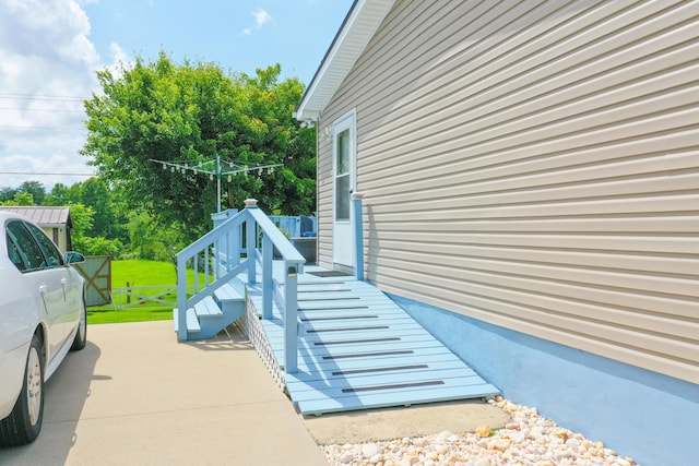 1809 Pine Top Rd, London, KY 40741 - view of side of home featuring a patio and stairway