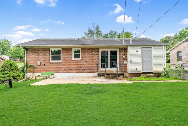 139 Tartan Dr, Lexington, KY 40517 - rear view of house featuring a patio, brick siding, entry steps, and a shingled roof