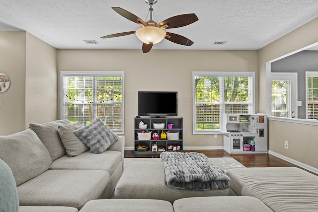 3072 Majestic View Walk, Lexington, KY 40511 - living area featuring a ceiling fan, wood finished floors, healthy amount of natural light, and a textured ceiling