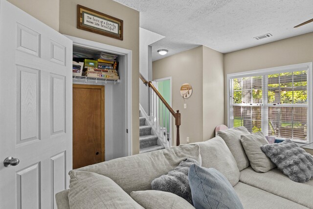 3072 Majestic View Walk, Lexington, KY 40511 - living area with stairs and a textured ceiling