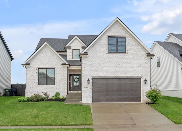1912 Tidewater Flt, Lexington, KY 40509 - view of front of home with an attached garage, driveway, brick siding, and roof with shingles