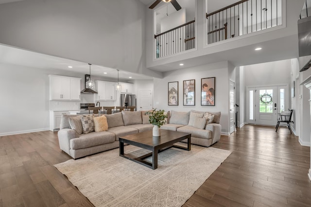 1912 Tidewater Flt, Lexington, KY 40509 - living room with a high ceiling, ceiling fan, dark wood-style flooring, and recessed lighting