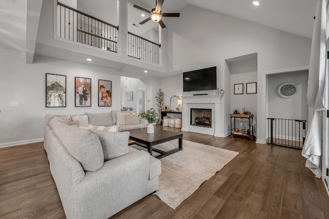 1912 Tidewater Flt, Lexington, KY 40509 - living room with high vaulted ceiling, ceiling fan, a fireplace, dark wood-style floors, and recessed lighting