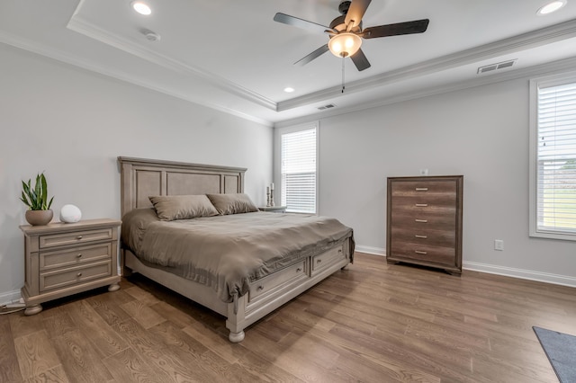 1912 Tidewater Flt, Lexington, KY 40509 - bedroom featuring a tray ceiling, ornamental molding, wood finished floors, recessed lighting, and ceiling fan