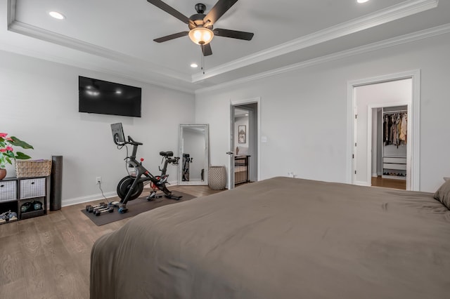 1912 Tidewater Flt, Lexington, KY 40509 - bedroom with a tray ceiling, ornamental molding, recessed lighting, wood finished floors, and ceiling fan