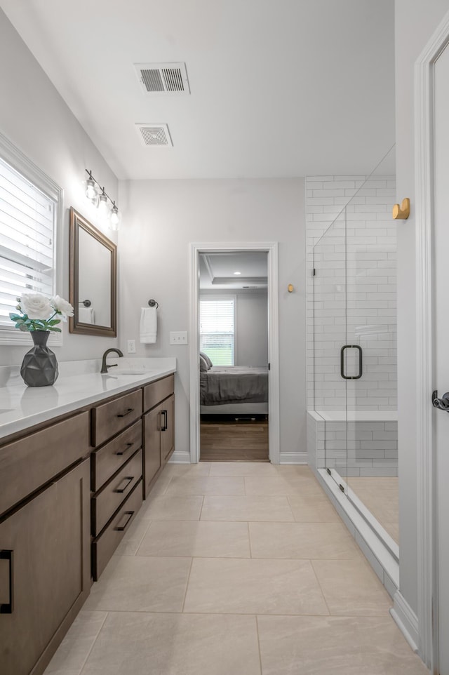 1912 Tidewater Flt, Lexington, KY 40509 - ensuite bathroom featuring vanity, a shower stall, and tile patterned floors