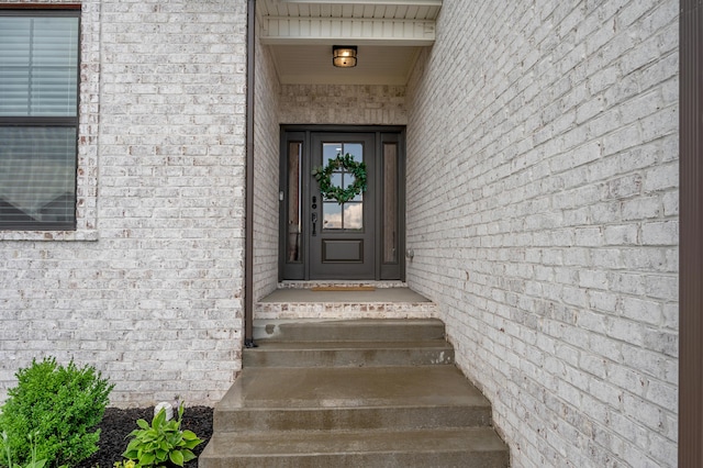1912 Tidewater Flt, Lexington, KY 40509 - property entrance featuring brick siding