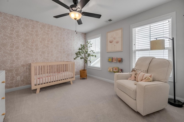 1912 Tidewater Flt, Lexington, KY 40509 - bedroom featuring carpet, wallpapered walls, a ceiling fan, and a nursery area