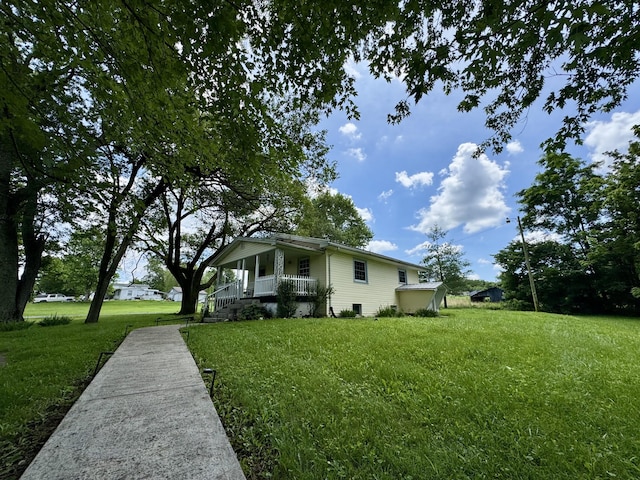 120 Lanetown Rd, Nancy, KY 42544 - view of side of home featuring covered porch and a lawn