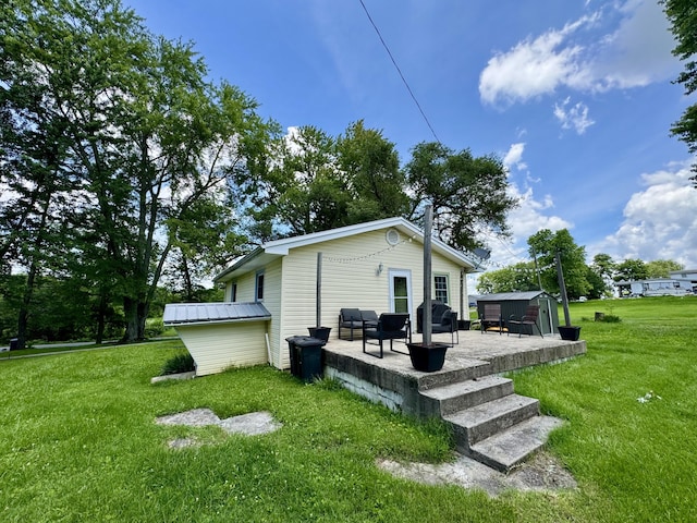 120 Lanetown Rd, Nancy, KY 42544 - back of house with a patio, a lawn, and a storage shed