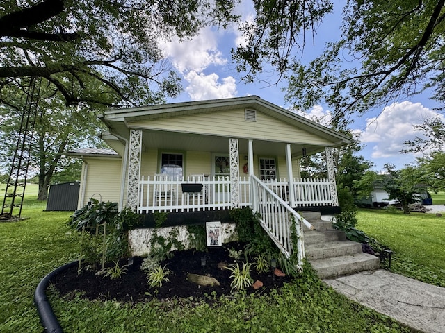 120 Lanetown Rd, Nancy, KY 42544 - view of front of house featuring a porch and a front yard