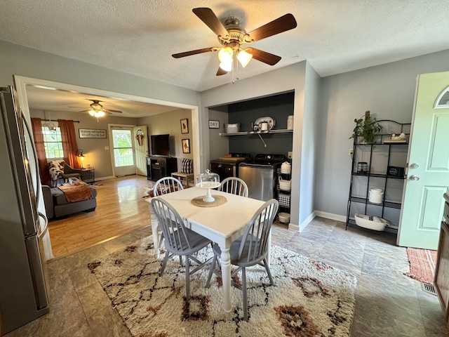 120 Lanetown Rd, Nancy, KY 42544 - dining room featuring washer and clothes dryer, ceiling fan, and a textured ceiling