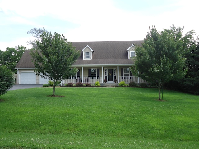 407 Autumn Dr, Lancaster, KY 40444 - cape cod-style house featuring covered porch, driveway, a front yard, and a garage