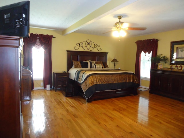 407 Autumn Dr, Lancaster, KY 40444 - bedroom featuring wood finished floors, beam ceiling, and a ceiling fan