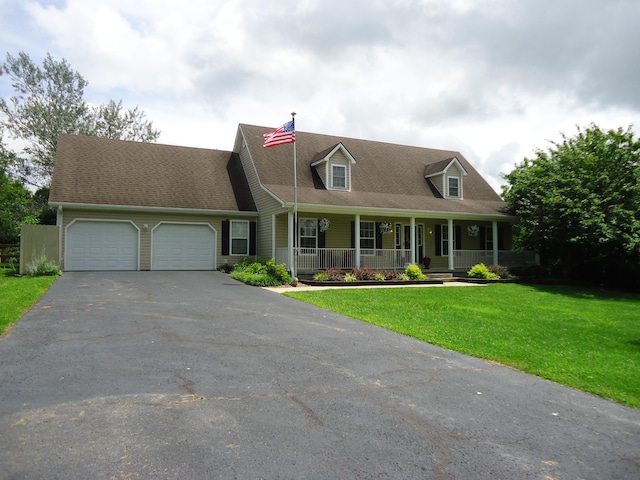 407 Autumn Dr, Lancaster, KY 40444 - cape cod home with a garage, covered porch, asphalt driveway, a front yard, and a shingled roof
