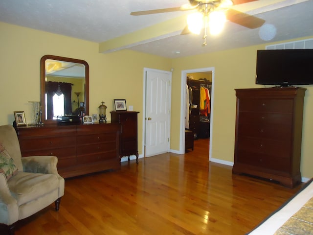 407 Autumn Dr, Lancaster, KY 40444 - bedroom featuring wood finished floors, a spacious closet, a ceiling fan, and a closet