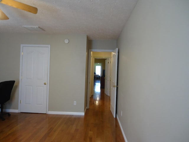 407 Autumn Dr, Lancaster, KY 40444 - corridor with wood finished floors and a textured ceiling