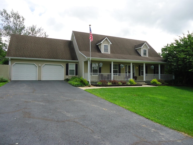 407 Autumn Dr, Lancaster, KY 40444 - new england style home with an attached garage, asphalt driveway, a porch, a front yard, and roof with shingles