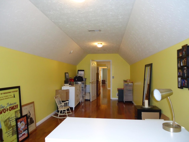 407 Autumn Dr, Lancaster, KY 40444 - bedroom with wood finished floors, a textured ceiling, and vaulted ceiling