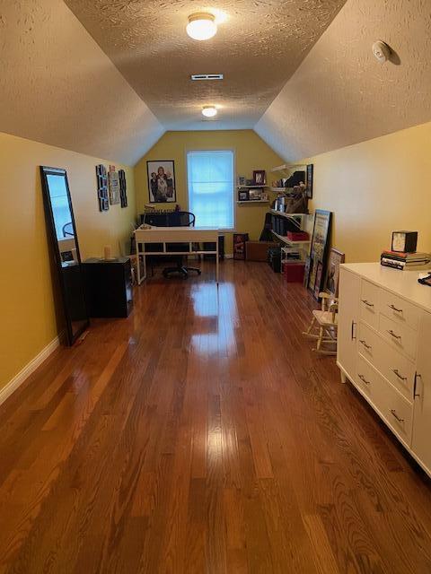407 Autumn Dr, Lancaster, KY 40444 - office featuring a textured ceiling, dark wood finished floors, and lofted ceiling