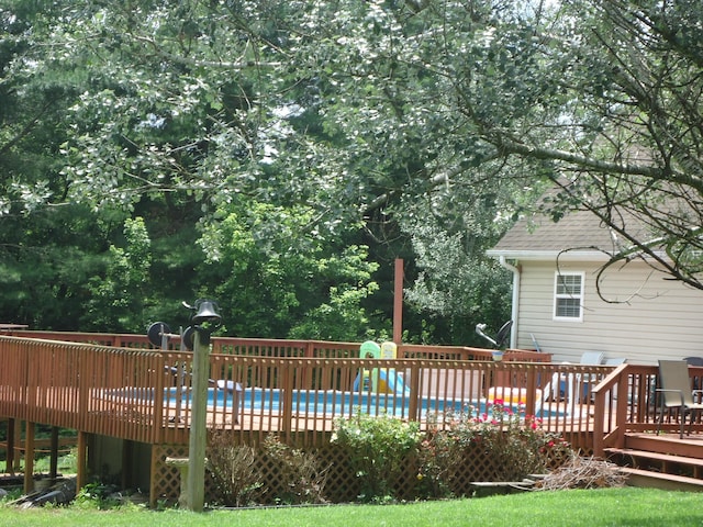407 Autumn Dr, Lancaster, KY 40444 - view of swimming pool with a wooden deck and view of scattered trees