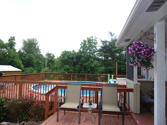 407 Autumn Dr, Lancaster, KY 40444 - wooden deck featuring view of wooded area