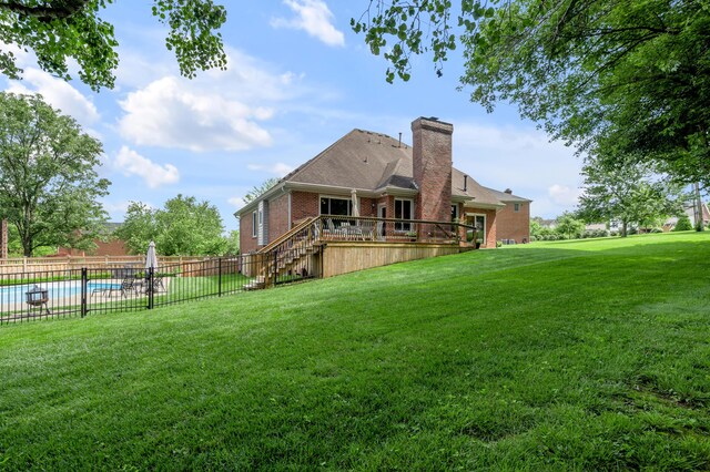 315 The Woods Ln, Winchester, KY 40391 - rear view of property with brick siding, a chimney, stairway, and a wooden deck