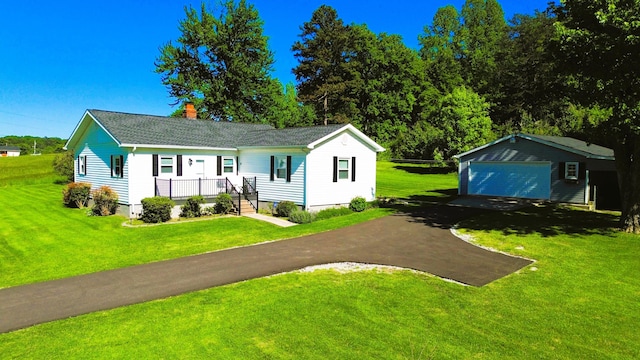1185 Oak Ridge Rd, Corbin, KY 40701 - single story home featuring asphalt driveway, a chimney, and a front yard