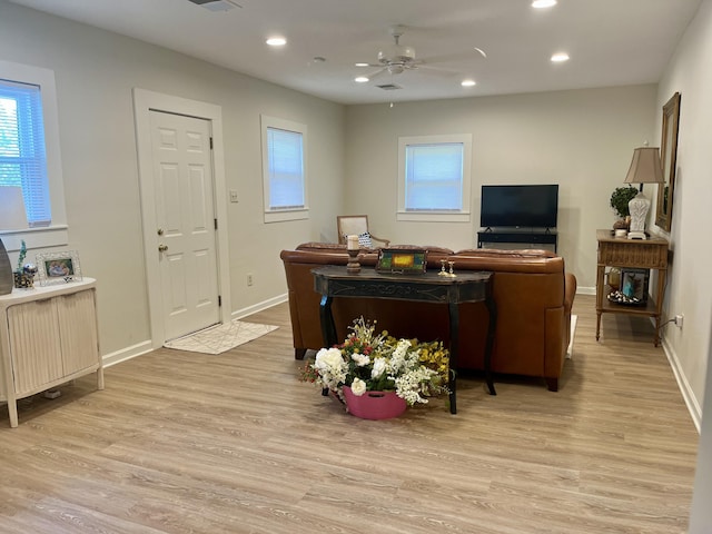 1185 Oak Ridge Rd, Corbin, KY 40701 - living area featuring recessed lighting, healthy amount of natural light, light wood-type flooring, ceiling fan, and radiator heating unit