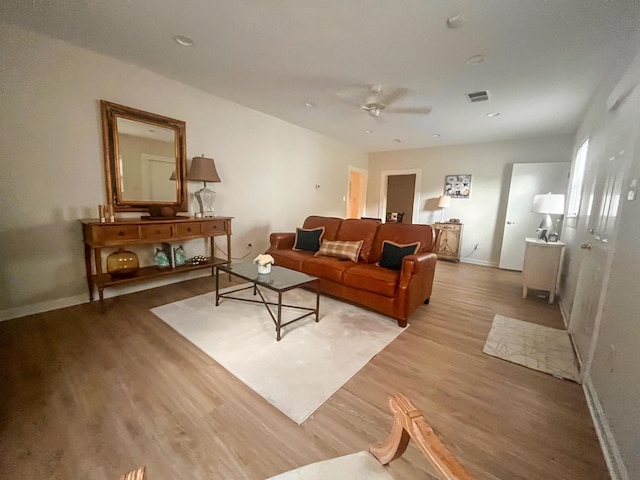 1185 Oak Ridge Rd, Corbin, KY 40701 - living area with a ceiling fan and light wood finished floors