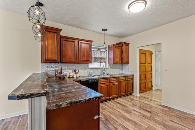 332 Weslyn Way, Nicholasville, KY 40356 - kitchen featuring a peninsula, backsplash, a textured ceiling, light wood-type flooring, and dishwasher