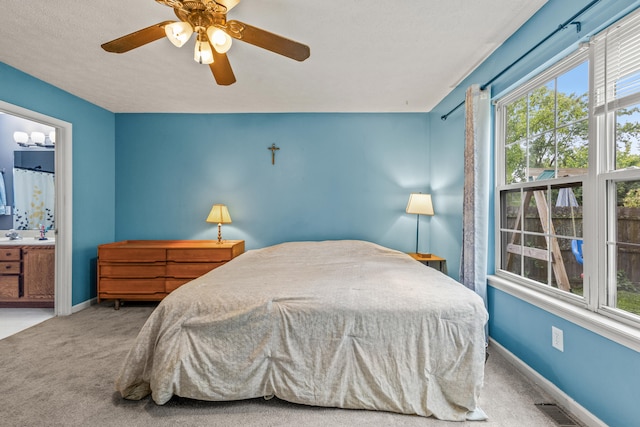 332 Weslyn Way, Nicholasville, KY 40356 - bedroom with carpet floors, ensuite bath, and ceiling fan