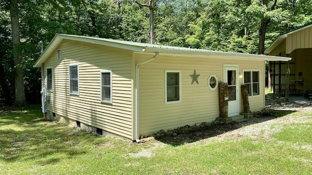 2240 Denny Ridge Rd, Nancy, KY 42544 - view of property exterior with a yard, a metal roof, and entry steps