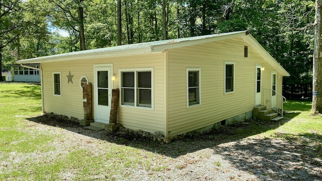 2240 Denny Ridge Rd, Nancy, KY 42544 - view of front facade with entry steps, a front yard, and a metal roof