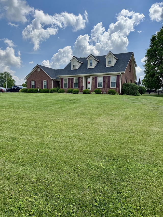4295 Vince Rd, Nicholasville, KY 40356 - view of front of property with brick siding, a front yard, and a shingled roof