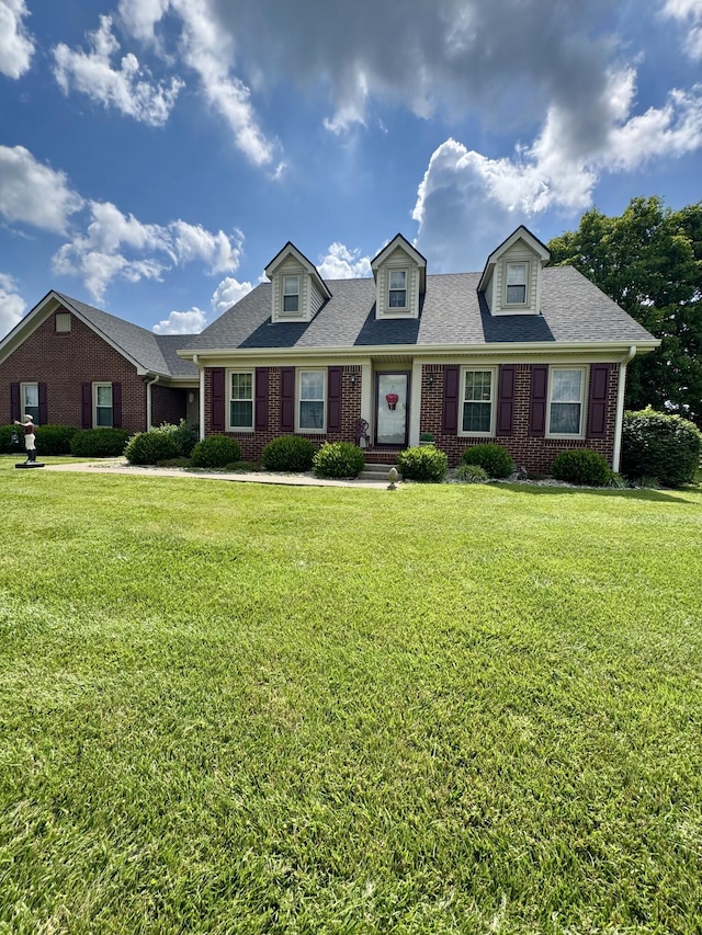 4295 Vince Rd, Nicholasville, KY 40356 - view of front of property with brick siding, a front lawn, and roof with shingles