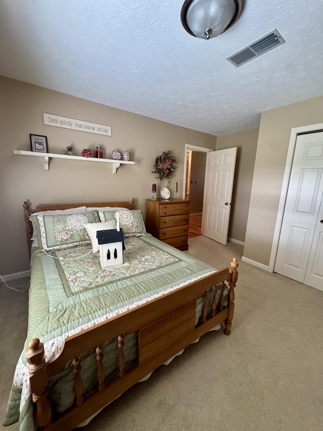4295 Vince Rd, Nicholasville, KY 40356 - carpeted bedroom with baseboards and a textured ceiling