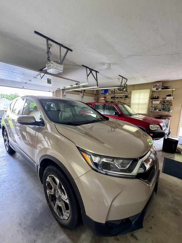 4295 Vince Rd, Nicholasville, KY 40356 - garage featuring a garage door opener