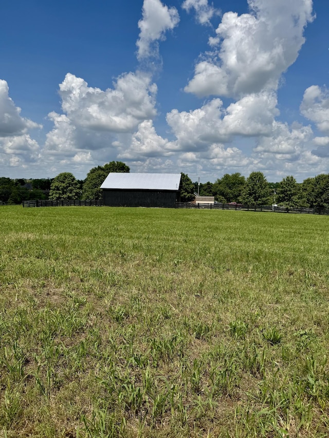 4295 Vince Rd, Nicholasville, KY 40356 - view of yard with a view of countryside, a pole building, and an outbuilding