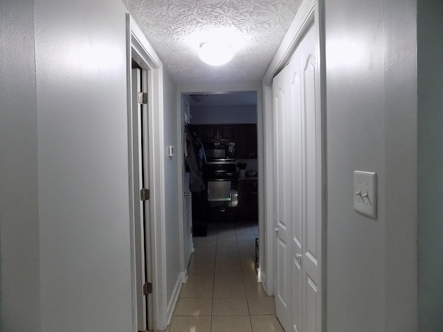 131 Regency Point Path, Lexington, KY 40503 - hallway featuring light tile patterned floors and a textured ceiling