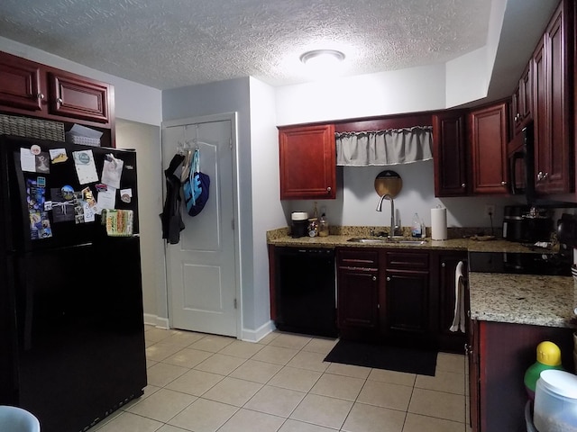 131 Regency Point Path, Lexington, KY 40503 - kitchen with black appliances, reddish brown cabinets, light tile patterned flooring, a textured ceiling, and light stone countertops
